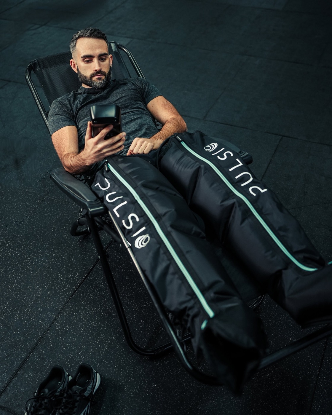 Athlète en bottes de compression Pulsio